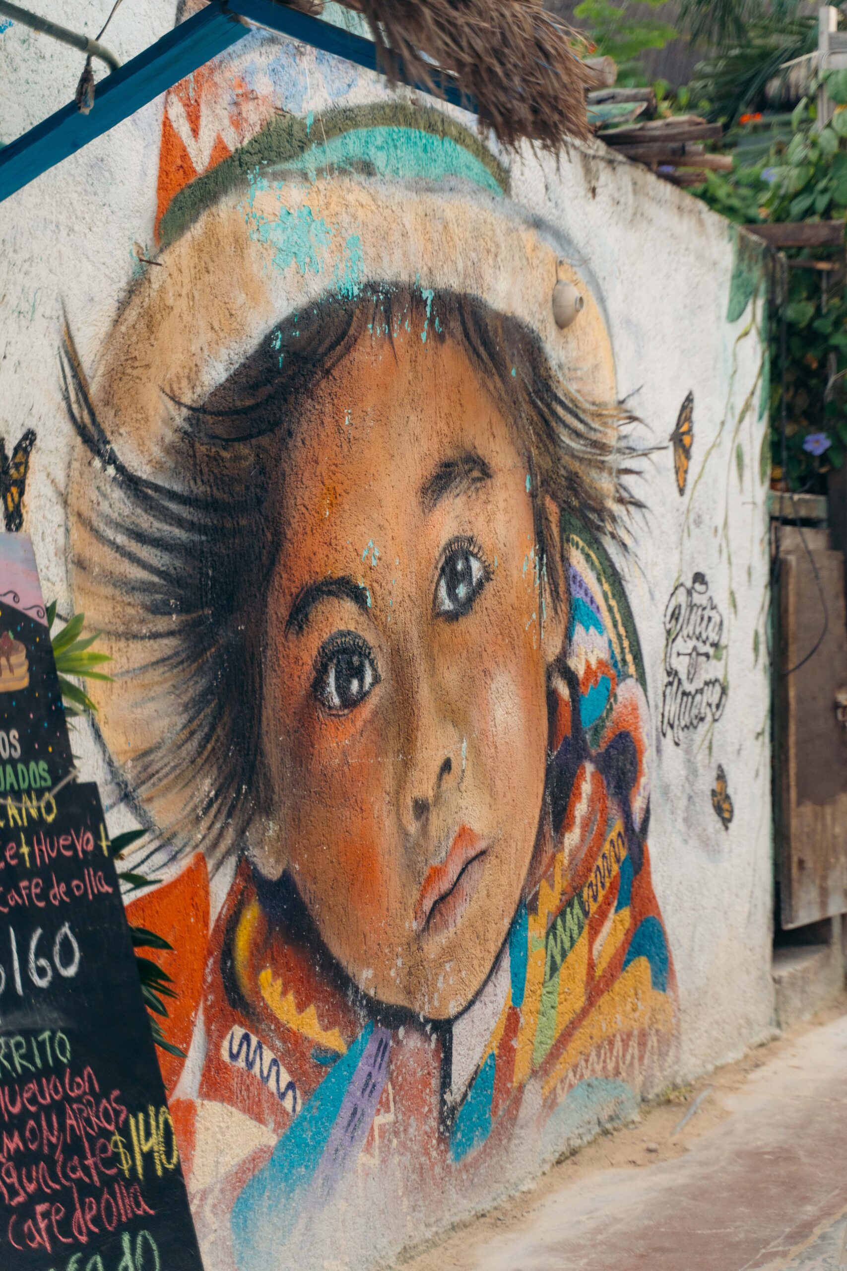 Mural of children’s faces near Casa Alebrije in Holbox.