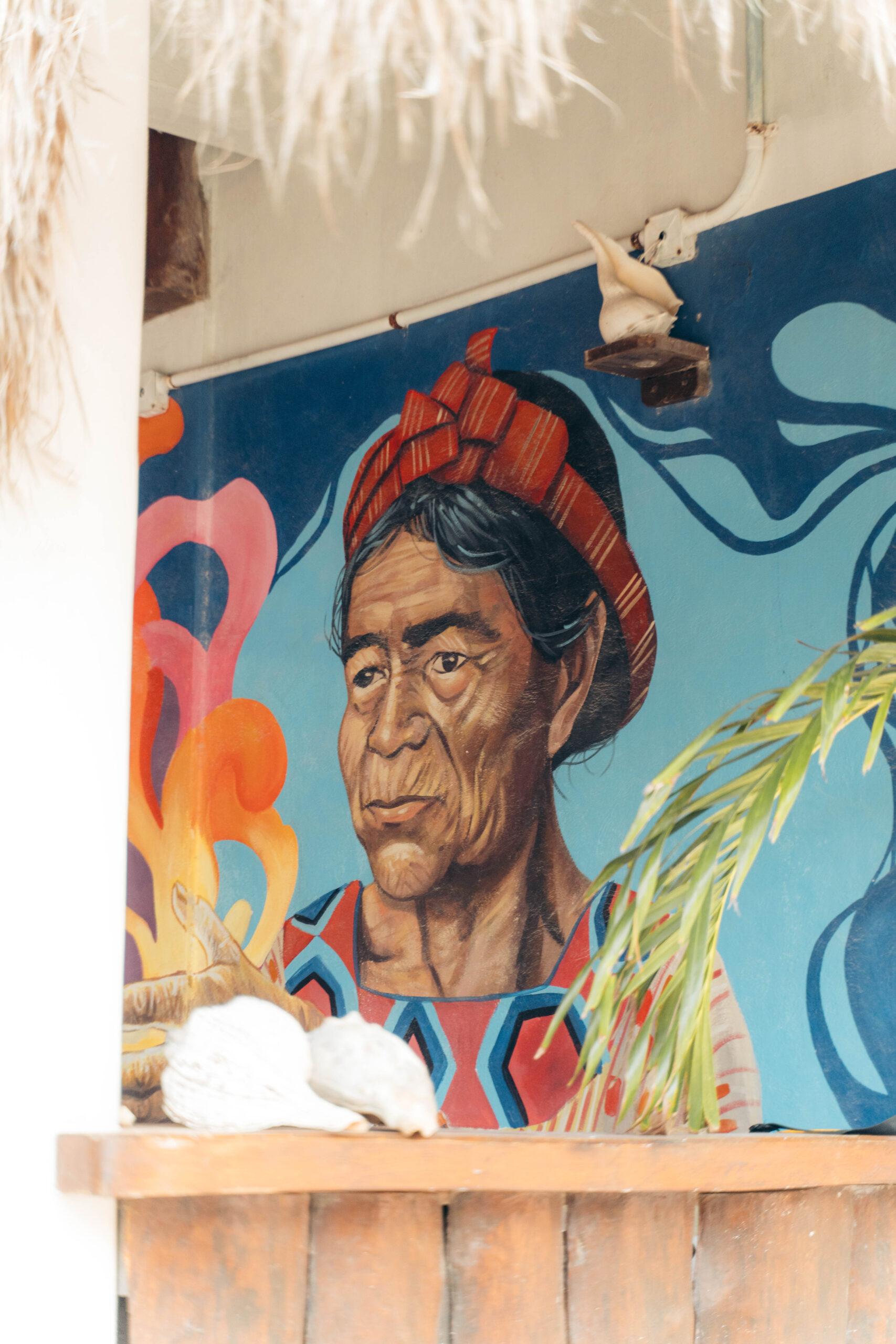 Street art of a old woman on Calle Carito, Holbox Island.