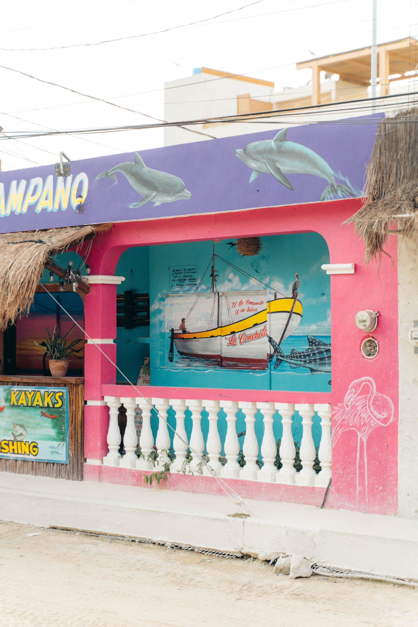 Boat mural on the wall of La Esquina de Pampano in Holbox