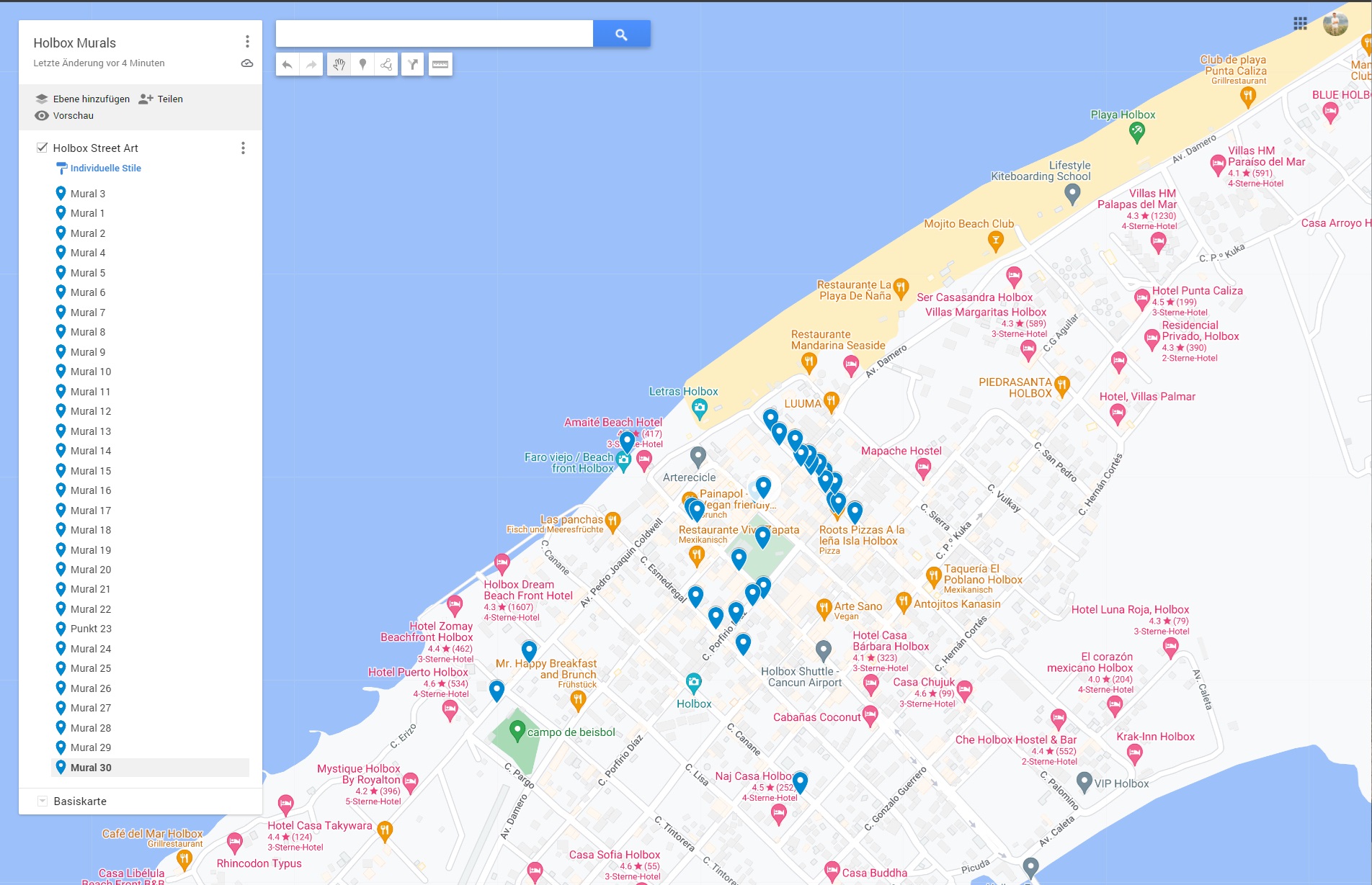 Google Maps screenshot showing the exact locations of street art murals across Holbox Island.
